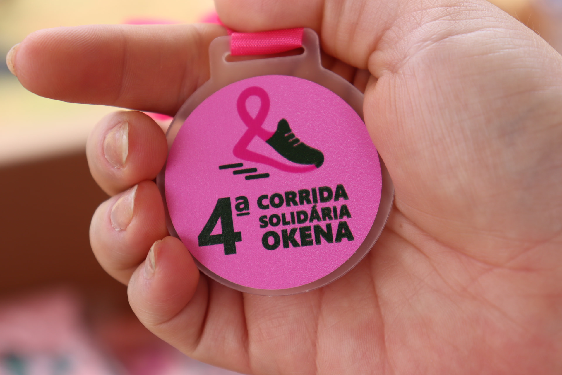 Medalha da 4ª Corrida Solidária Okena
